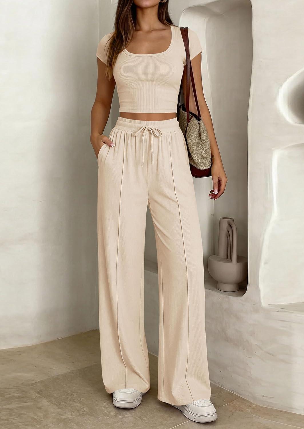 imagePRETTYGARDEN Womens 2 Piece Matching Lounge Sets Ribbed Short Sleeve Crop Tops Wide Leg Pants 2026 Summer Airport OutfitsBeige