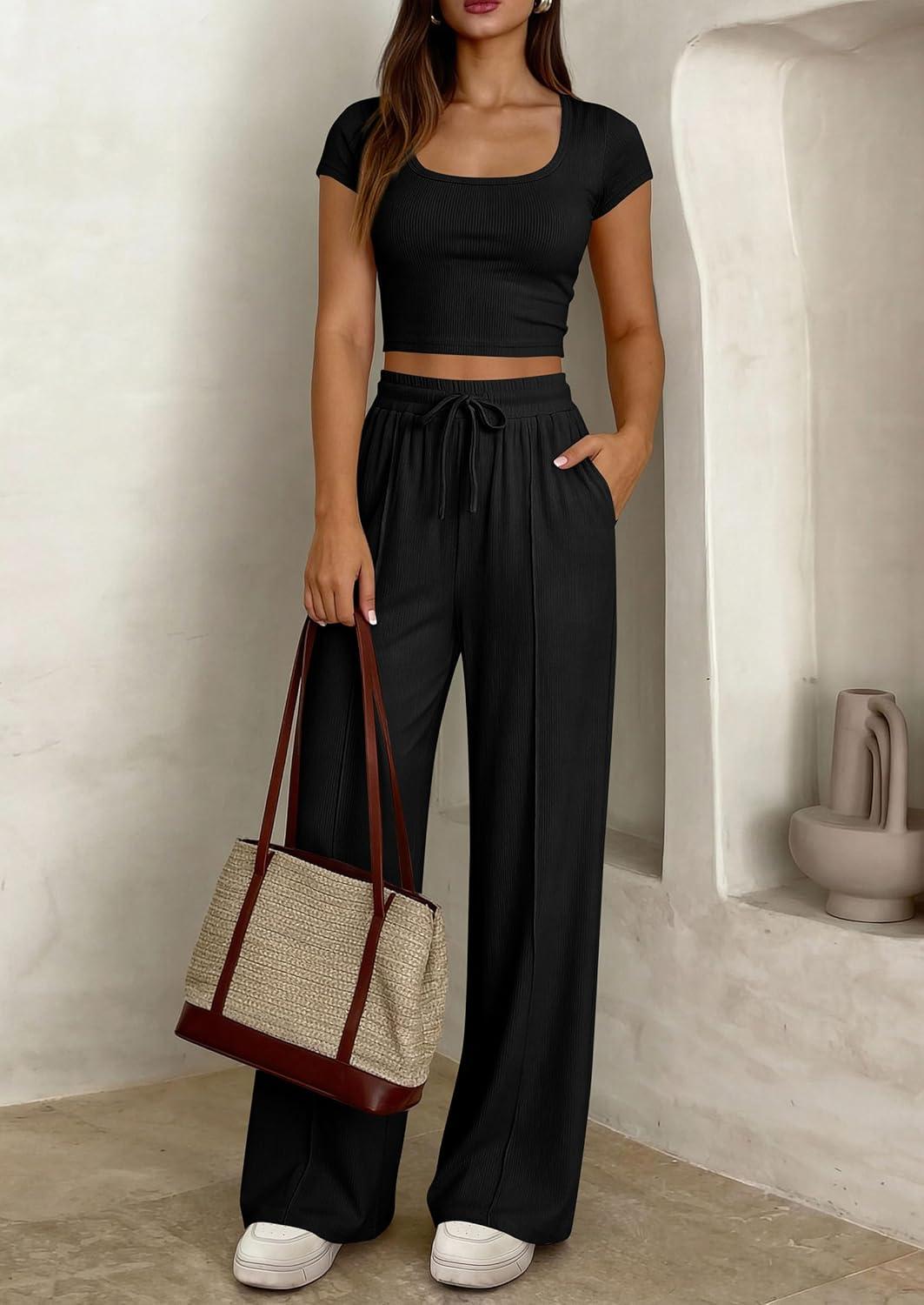 imagePRETTYGARDEN Womens 2 Piece Matching Lounge Sets Ribbed Short Sleeve Crop Tops Wide Leg Pants 2026 Summer Airport OutfitsBlack