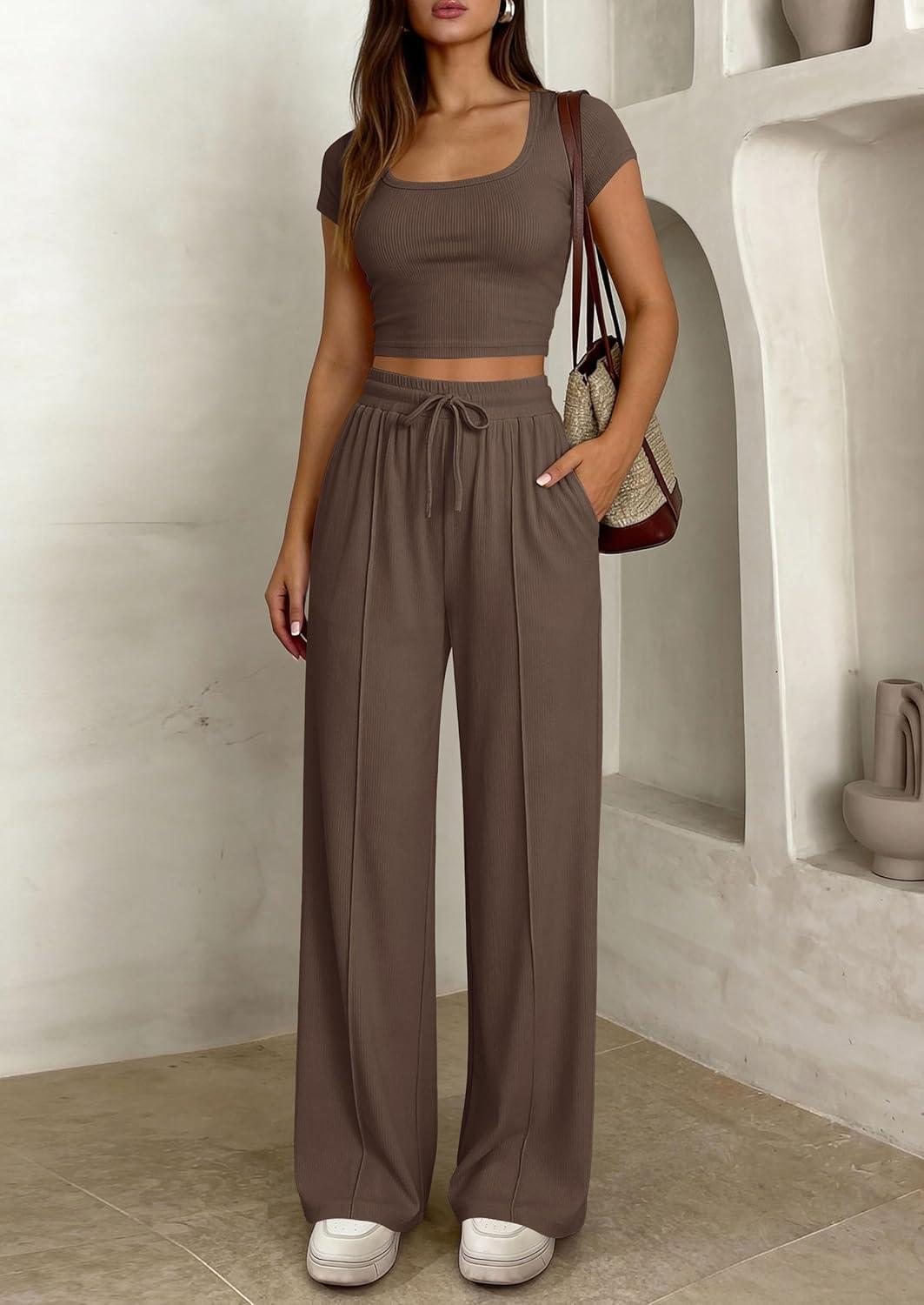imagePRETTYGARDEN Womens 2 Piece Matching Lounge Sets Ribbed Short Sleeve Crop Tops Wide Leg Pants 2026 Summer Airport OutfitsBrown
