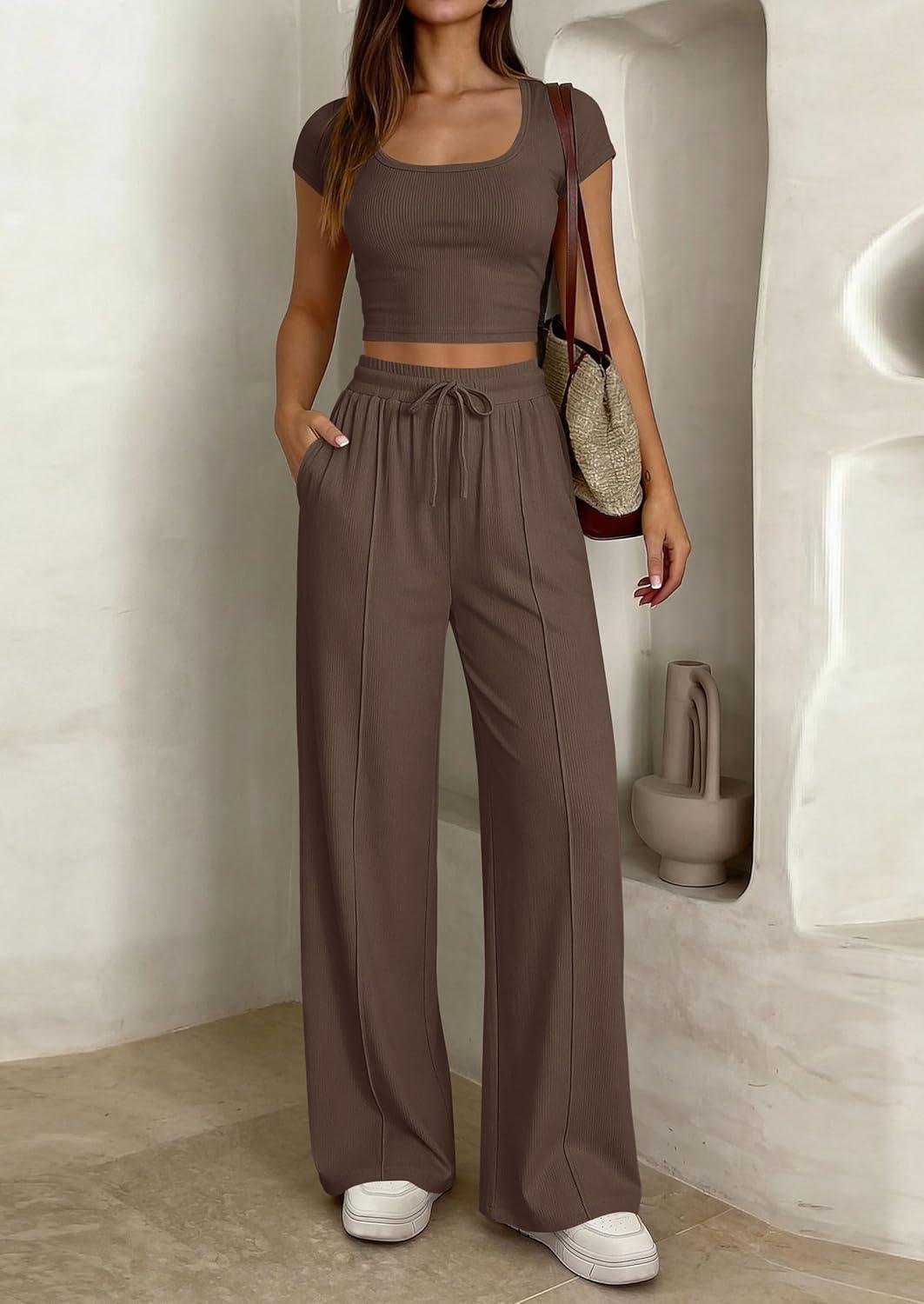 imagePRETTYGARDEN Womens 2 Piece Matching Lounge Sets Ribbed Short Sleeve Crop Tops Wide Leg Pants 2026 Summer Airport OutfitsBrown