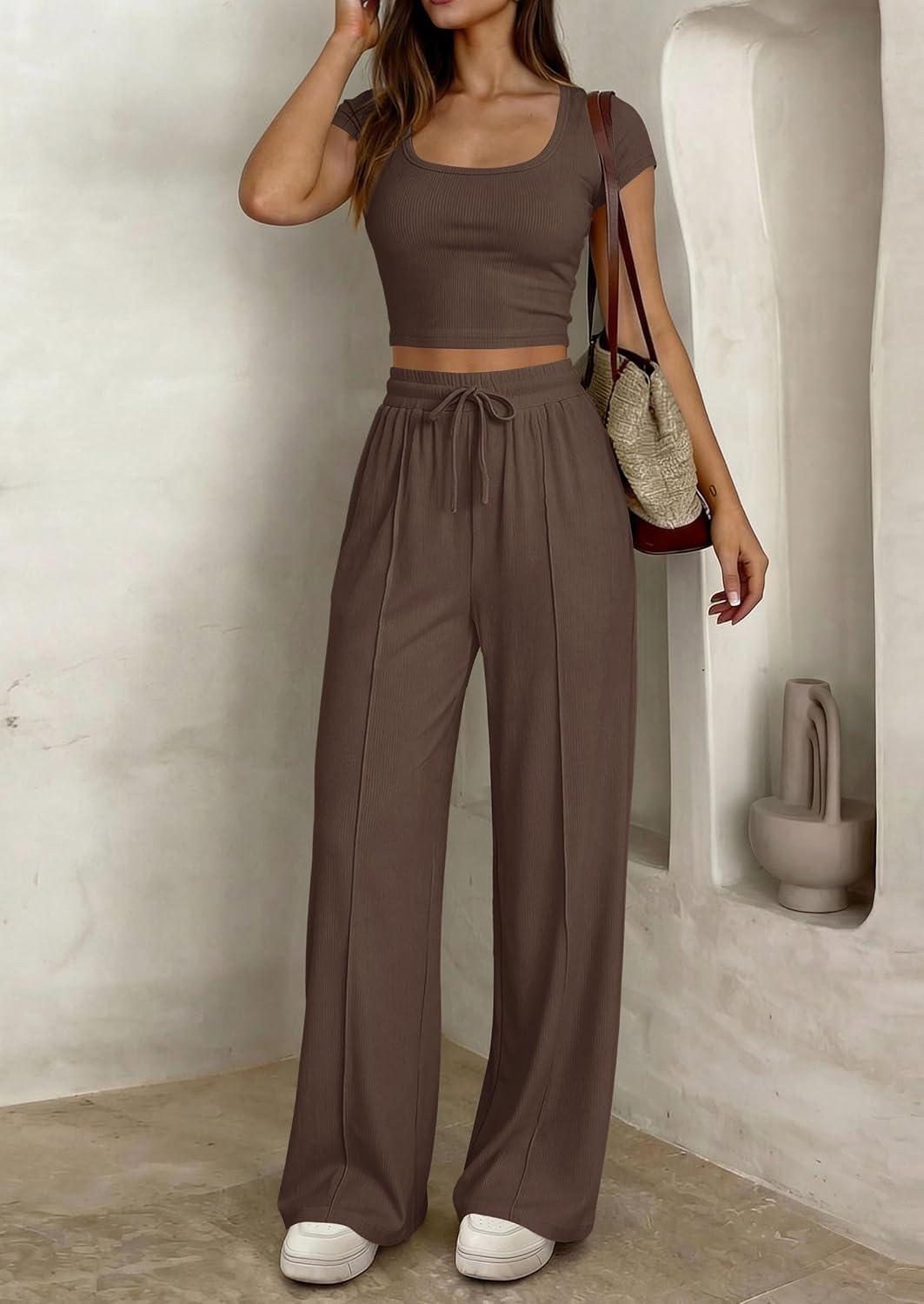 imagePRETTYGARDEN Womens 2 Piece Matching Lounge Sets Ribbed Short Sleeve Crop Tops Wide Leg Pants 2026 Summer Airport OutfitsBrown
