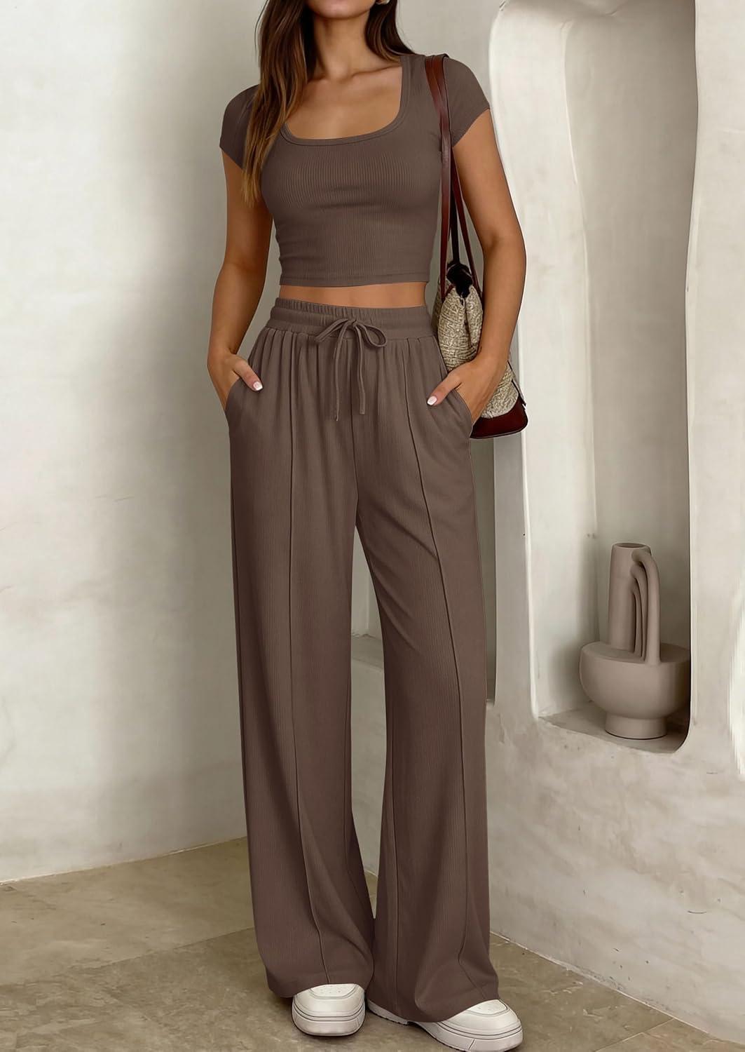 imagePRETTYGARDEN Womens 2 Piece Matching Lounge Sets Ribbed Short Sleeve Crop Tops Wide Leg Pants 2026 Summer Airport OutfitsBrown
