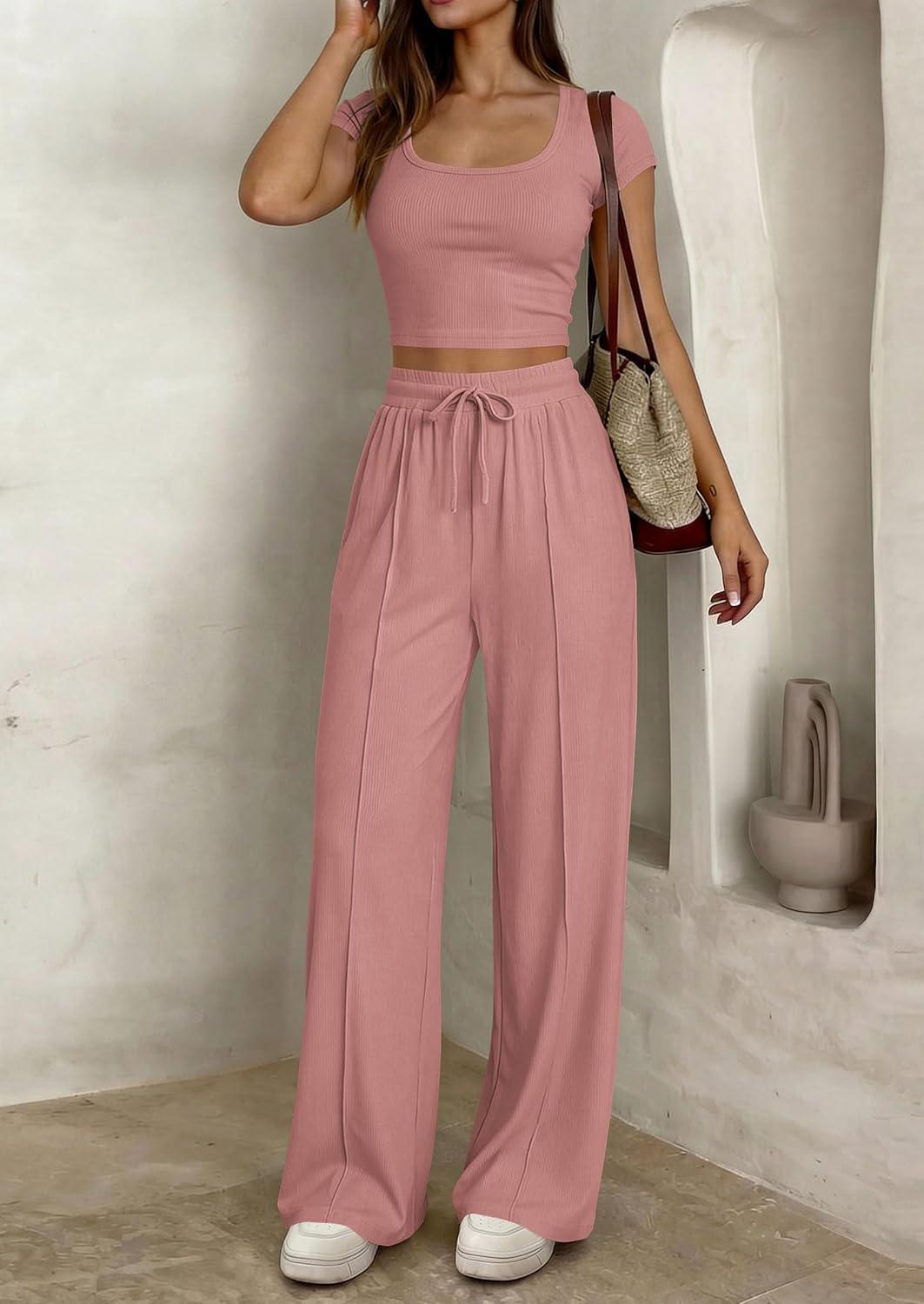 imagePRETTYGARDEN Womens 2 Piece Matching Lounge Sets Ribbed Short Sleeve Crop Tops Wide Leg Pants 2026 Summer Airport OutfitsPink